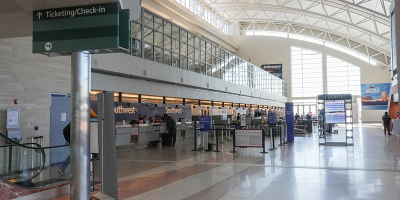 Airline check-in counters and baggage screening equipment in the MAF terminal